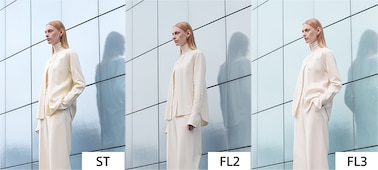 Esimerkkikuva naisesta, jolla on valkoiset vaatteet, kuvattu Creative Look ST, FL2, FL3 -asetuksilla.